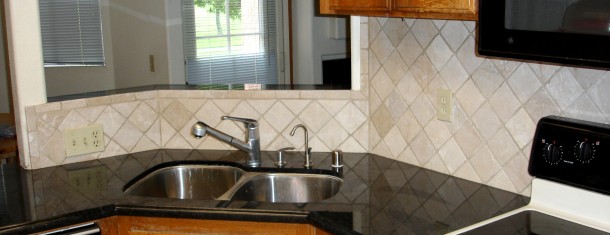 Kitchen backsplash with granite countertops